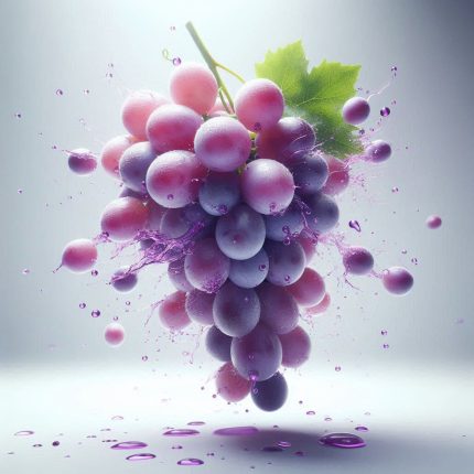 Tasty purple grapes with juice splashing